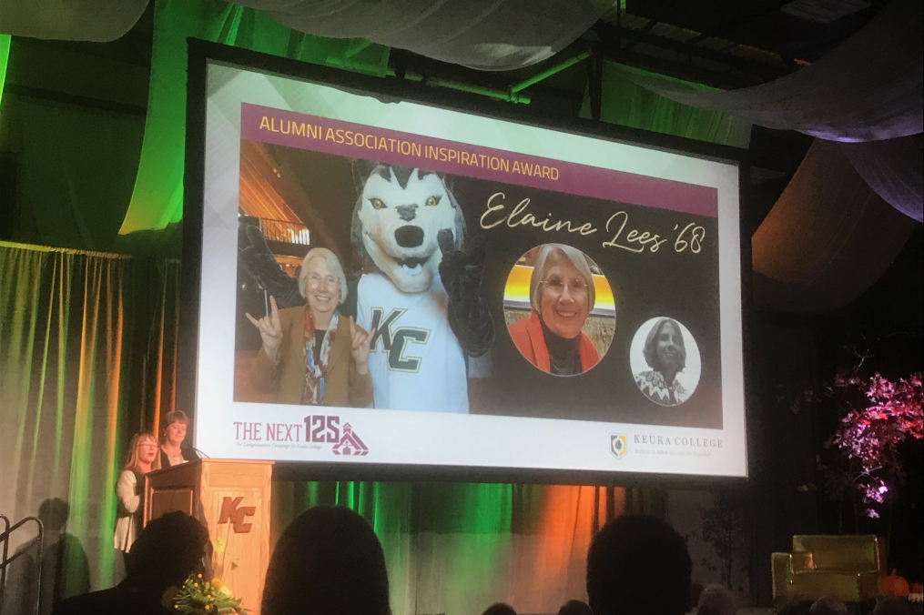 President of the Keuka College Alumni Association Executive Council Chrisy Ahlbert AmEnde '83, left, and Assistant Director of Alumni Relations Laurie Adams '83 present the Alumni Association Inspiration Award to Dr. Elaine O. Lees ’68 posthumously at the Oct. 13 Green &amp; Gold Celebration Weekend gala.